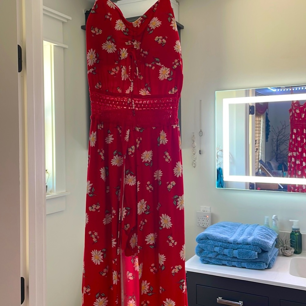 Red romper with white daisies